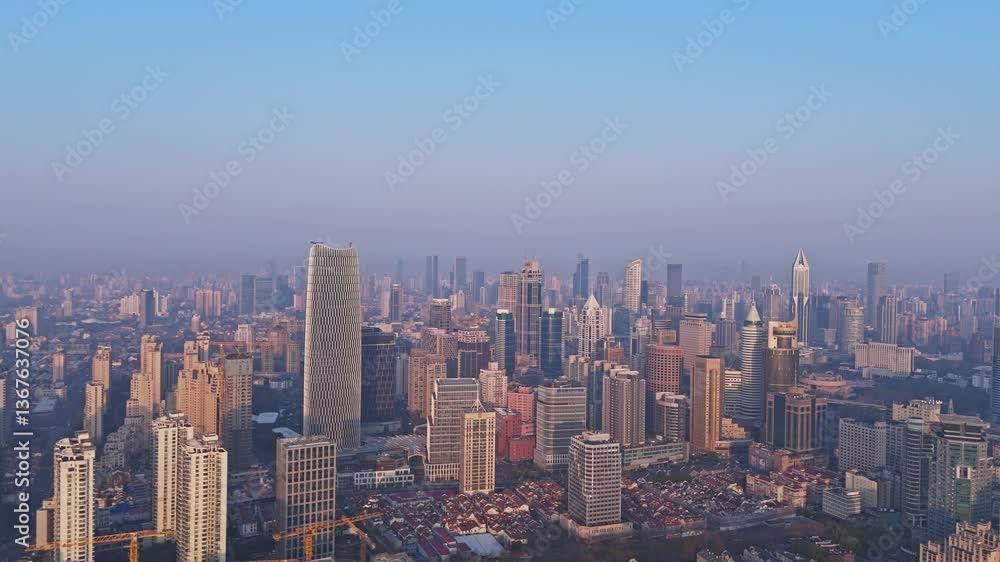 4K real time Aerial view of Shanghai modern buildings and traditional residential buildings at sunrise. 4K real time Aerial view of Shanghai modern buildings and traditional residential buildings at sunrise.