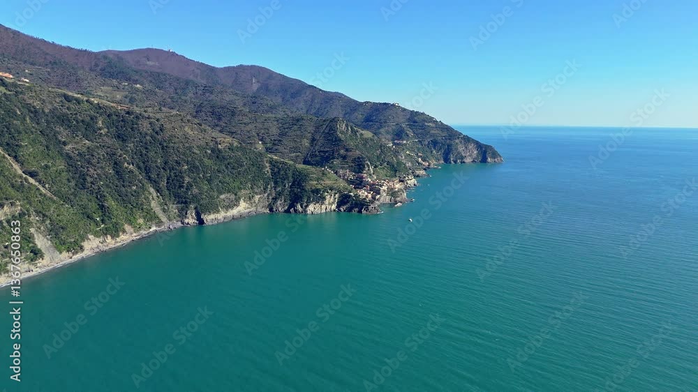 Clear blue waters and scenic coastline at Manarola, Cinque Terre, Italy Clear blue waters and scenic coastline at Manarola, Cinque Terre, Italy