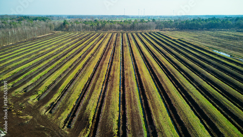 Lower Saxony, Germany - March 23, 2025: Drone footage of a peat mining area in Lower Saxony
