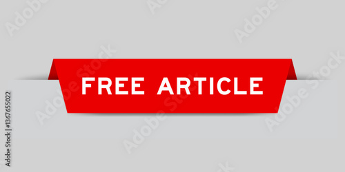 Red color inserted label with word free article on gray background