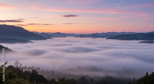 Wallpaper Mural Serene Sunrise Over Misty Valley with Mountains in Background, Ideal for Tranquil Scenes Torontodigital.ca