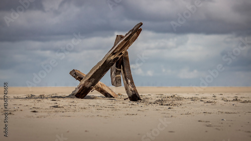 Bild auf Leinwand Bootwrack im Wattenmeer