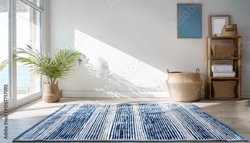 Empty White Wall Mockup in Coastal Interior with Natural Fiber Rug with Blue and White Striped Patterns. Natural Daylight From a Window. Promotion Background.
