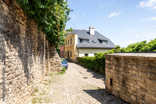 Well preserved historic buildings on quiet street Ruthardska in the historical part of Kutna Hora in Czech Republic