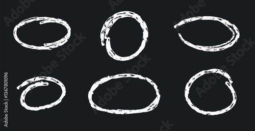 Set of crayon drawn circle and oval frame on dark blackboard