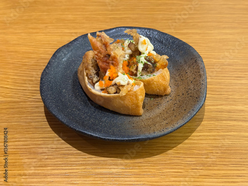 Obraz na płótnie asian japanese sushi mentai cheese soft shel crab bean curd tofu skin rice wrap in plate on wood table asian dim sum halal food restaurant cuisine banquet menu for cafe w salonie