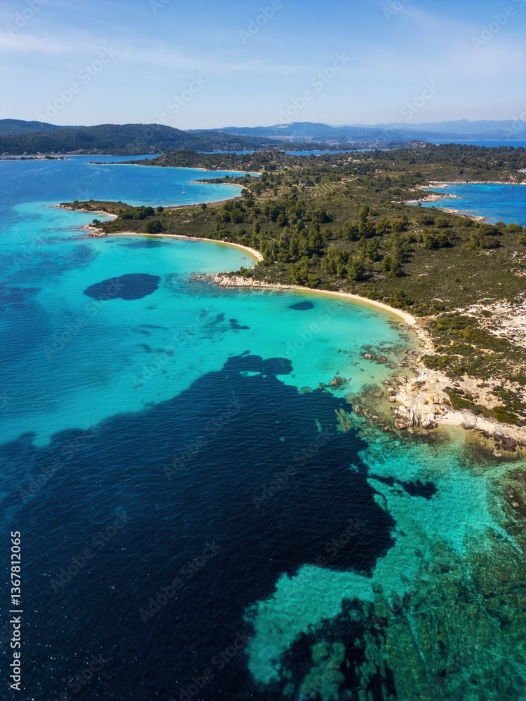 Diaporos island with wild beaches with turquoise water, drone aerial view, Chalkidiki Diaporos island with wild beaches with turquoise water, drone aerial view, Chalkidiki