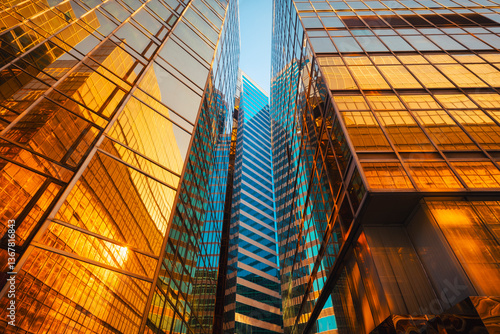 Gateway boulevard at harbour with golden buildings at sunset, Kowloon, Hong Kong