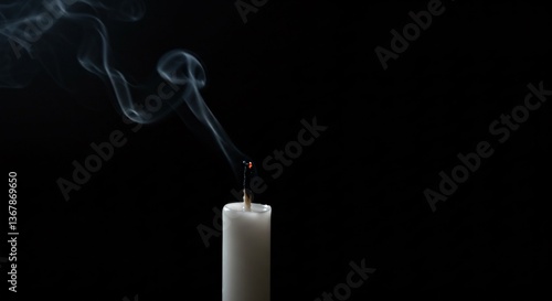 White candle with smoke, concept of memory. After extinguished candle for funeral service, remembrance, religion, ceremony, obituary, hope and peace for condolence card