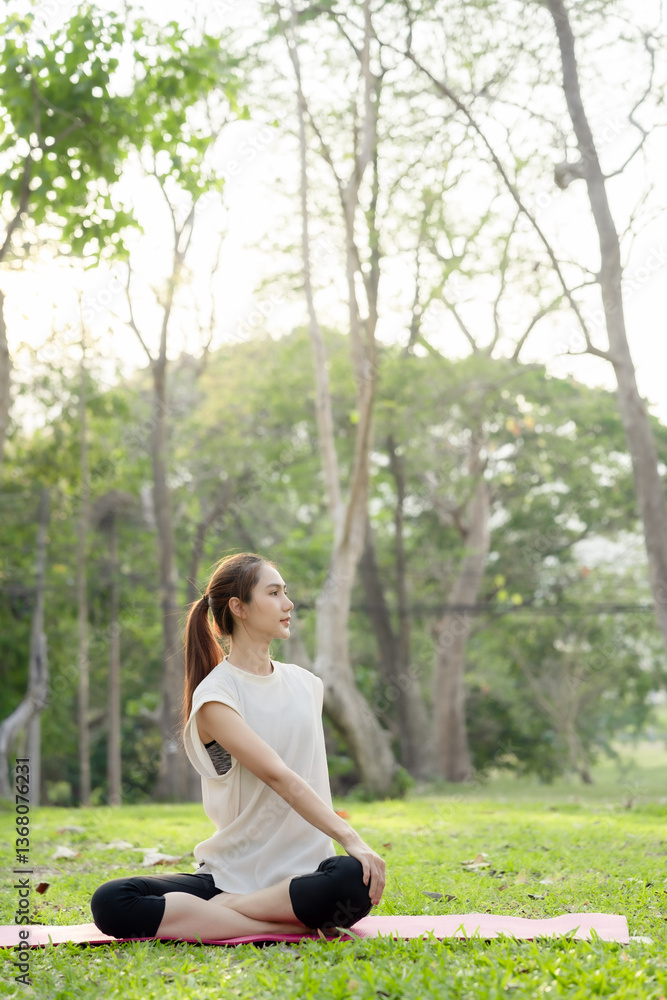 Young Asian woman doing yoga in the garden. Relaxing and healthy lifestyle concept. Young Asian woman doing yoga in the garden. Relaxing and healthy lifestyle concept.