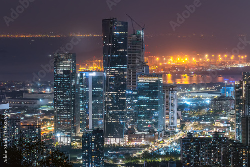 Wallpaper Mural Vibrant Nightscape of a Modern City Skyline with Illuminated Buildings Torontodigital.ca