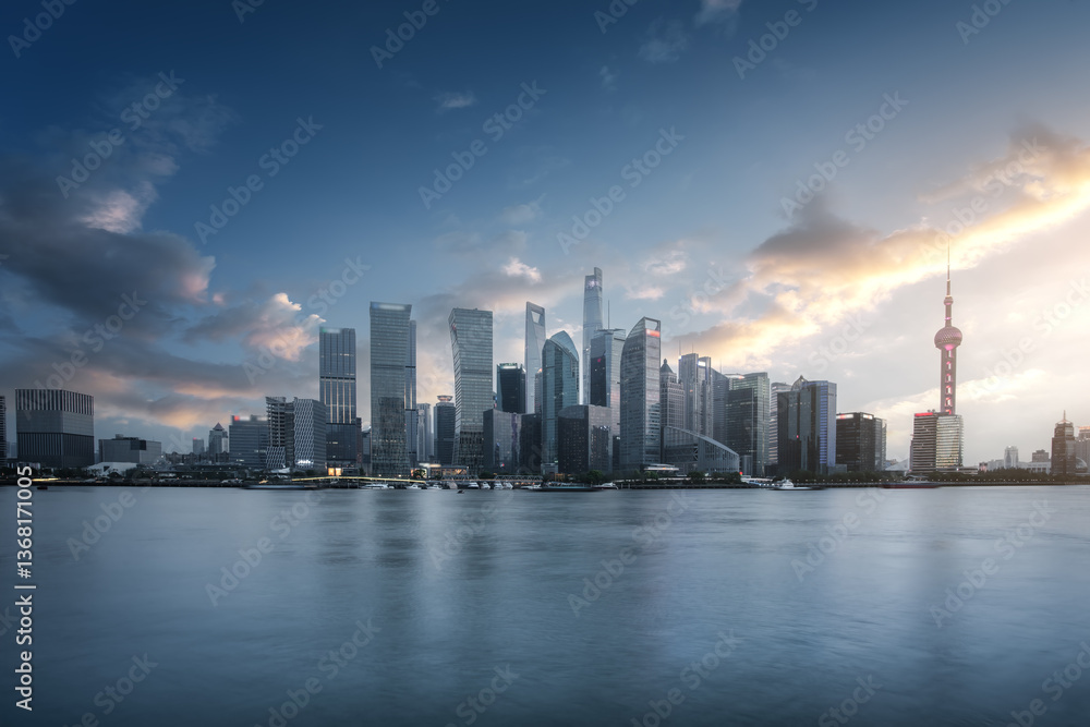 Stunning City Skyline at Sunset Over Water with Reflections Stunning City Skyline at Sunset Over Water with Reflections