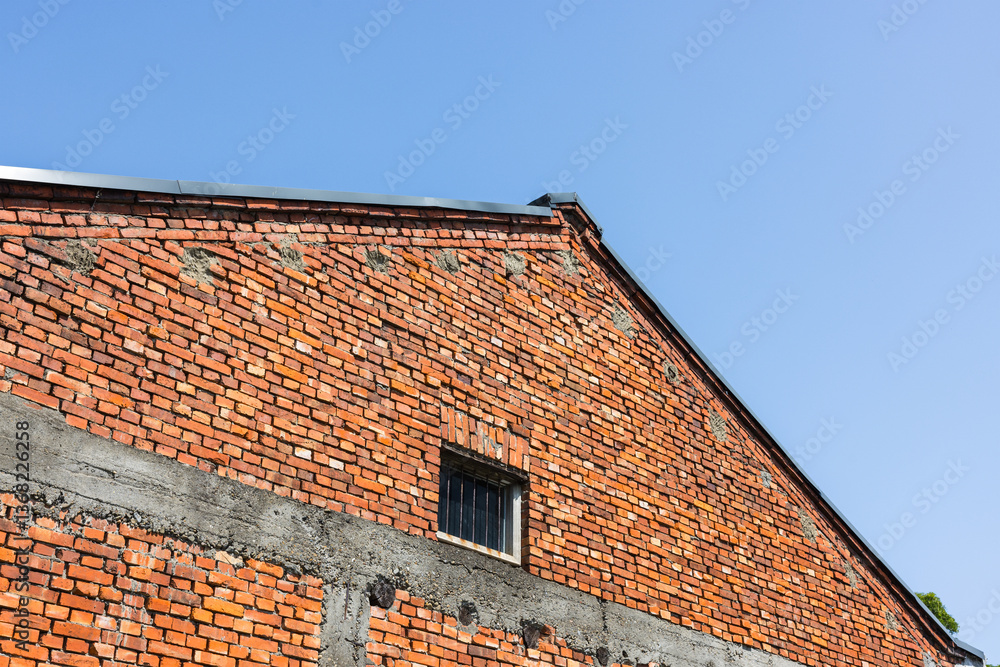 Historical red brick building with classic architecture