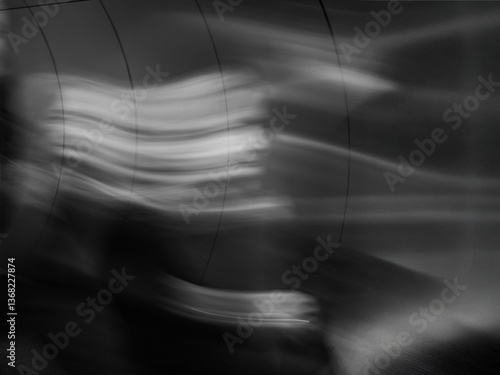 Artistic Long Exposure of a Woman's Face with Wave-like Motion in Black and White
