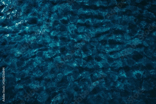 Obraz na płótnie small ripples on dark blue water in the sea w salonie