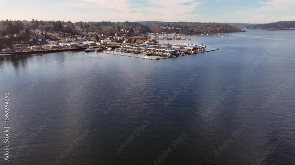Flying toward and around Port Orchard Marina with Port Orchard Foot Ferry Dock, located at Sinclair Inlet. Many boats moored at piers, - 4k aerial video footage, Flying toward and around Port Orchard Marina with Port Orchard Foot Ferry Dock, located at Sinclair Inlet. Many boats moored at piers, - 4k aerial video footage,