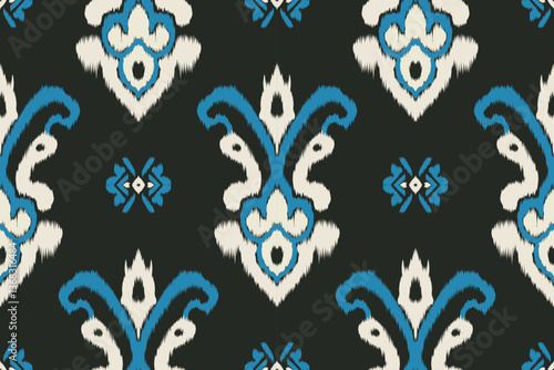 Seamless ethnic ikat pattern in tribal, folk embroidery, and Mexican style Aztec geometry for Graphic Arts, Carpet Design, Wallpaper, Wrapping, and Clothing.