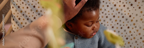Fotografie Website header shot Black baby girl peacefully sleeping in crib while mother car