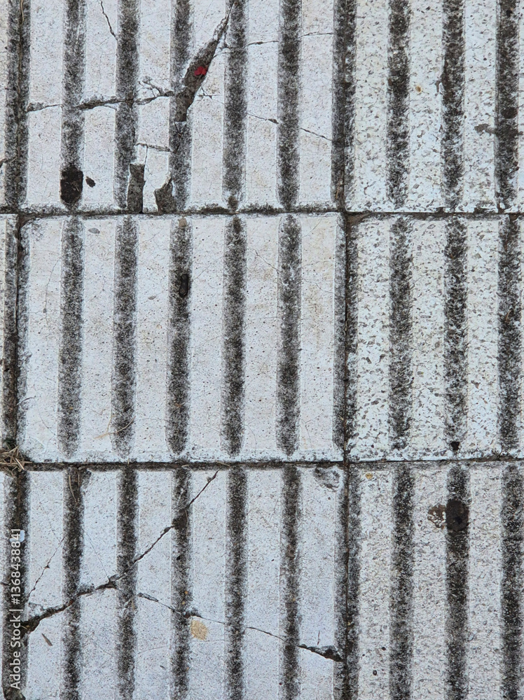 Detail of the tiles of a sidewalk.
