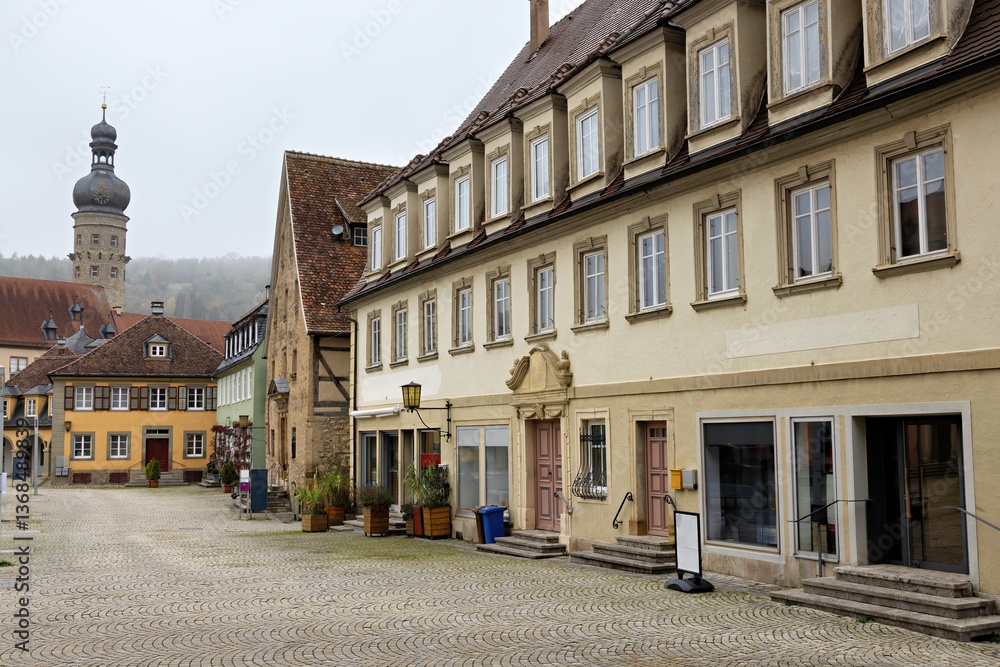 Naklejka premium City center with market square and church of Weikersheim in the Main-Tauber district in autumn