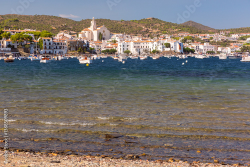 Obraz na płótnie Shallow coastal water and boats facing Cadaques village in Spain w salonie