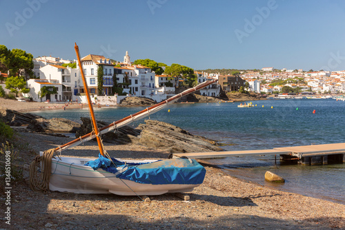 Obraz na płótnie Shallow coastal water and boats facing Cadaques village in Spain w salonie