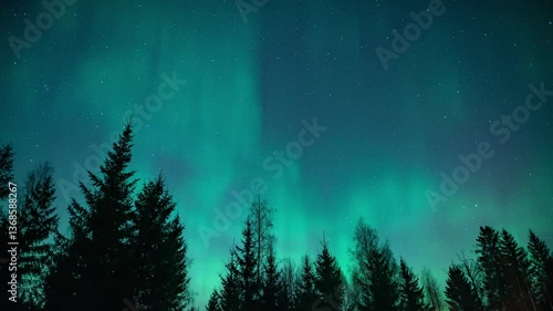 Timelapse of aurora borealis over the forests in early spring in Pirkanmaa, Finland
