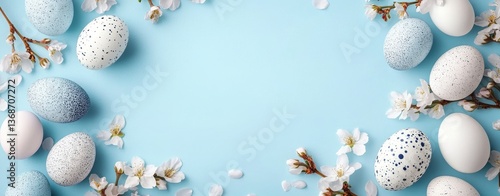 Obraz na płótnie Frame with white and blue speckled easter eggs and cherry blossoms on light blue background. Happy Easter concept. Simple spring template, w salonie