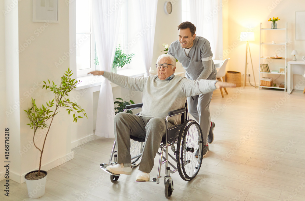 Fototapeta premium Male caregiver having fun together with his senior man patient, riding him in wheelchair, taking care in nursery room, giving help and entertaining. Old people care and assistance concept