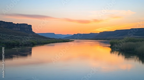 Wallpaper Mural Tranquil river scene at dusk, reflecting a warm sunset glow on the water Torontodigital.ca