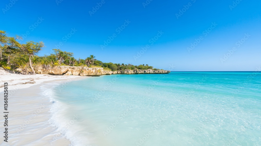 Tropical beach with clear water, palm trees on cliffs, and blue sky Tropical beach with clear water, palm trees on cliffs, and blue sky