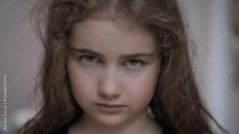Sad Thinking Curiosity Child Looking at Camera. Face Eyes Serious Contemplative Girl. Portrait of Upset Schoolgirl With Sadness, Bad Mood. Depressed Face. Negative Suppressed Emotions in Childhood. Sad Thinking Curiosity Child Looking at Camera. Face Eyes Serious Contemplative Girl. Portrait of Upset Schoolgirl With Sadness, Bad Mood. Depressed Face. Negative Suppressed Emotions in Childhood.