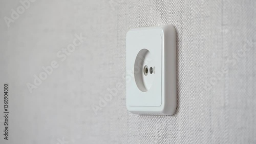 video in 4K format, plug is inserted into the socket and removed, connecting the phone, charging gadgets, turning on home appliances