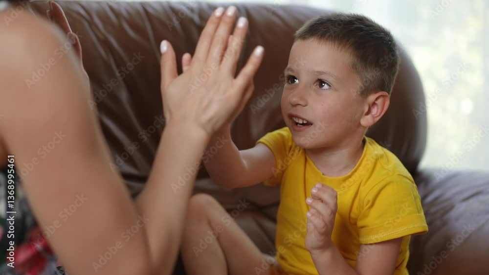 A delightful and joyful interaction during playtime, showcasing a child fully engaged in a fun and playful activity A delightful and joyful interaction during playtime, showcasing a child fully engaged in a fun and playful activity