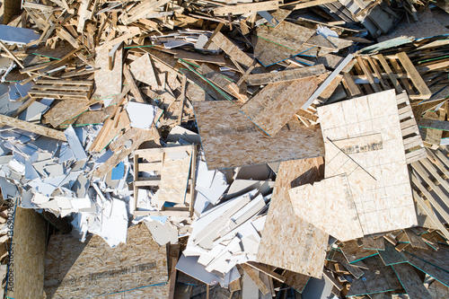 A pile of wood and debris from a wood scrap yard