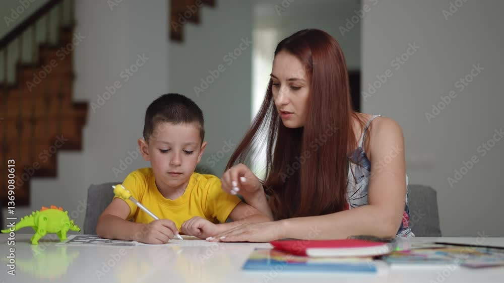 A caregiver guides a child through an educational activity, fostering creativity and joyful learning experiences A caregiver guides a child through an educational activity, fostering creativity and joyful learning experiences