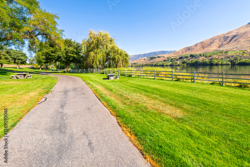 Fototapeta Naklejka Na Ścianę i Meble -  The scenic waterfront Kirby Billingsley Hydro Park along the Columbia River as it runs through East Wenatchee on Highway 28 in Chelan County, Washington State, USA.	