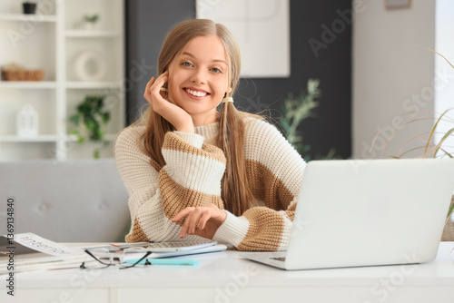 Young woman with magazines ...