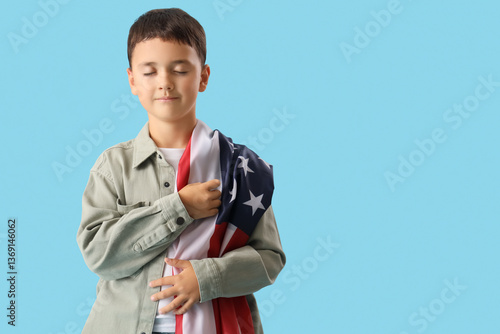 Little boy with USA flag pr...