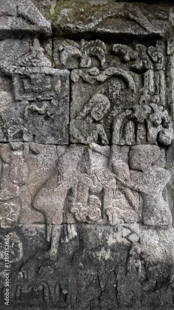 Carvings on the stone walls of Penataran temple. Penataran temple is one of the temples in Indonesia Carvings on the stone walls of Penataran temple. Penataran temple is one of the temples in Indonesia