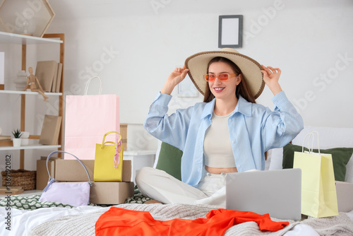 Young woman online shopping...