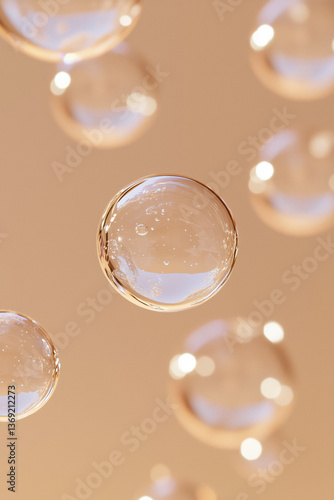 Obraz na płótnie Close-up of clear gel bubbles against a beige background. w salonie