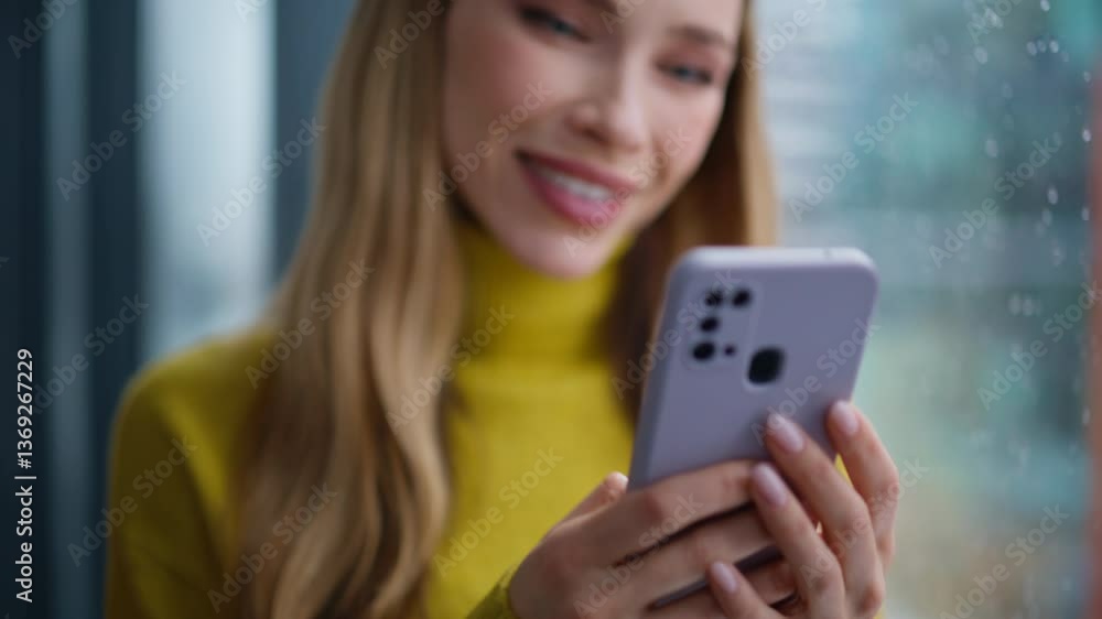 Woman hands sending sms by smartphone in apartment closeup. Smiling lady Woman hands sending sms by smartphone in apartment closeup. Smiling lady