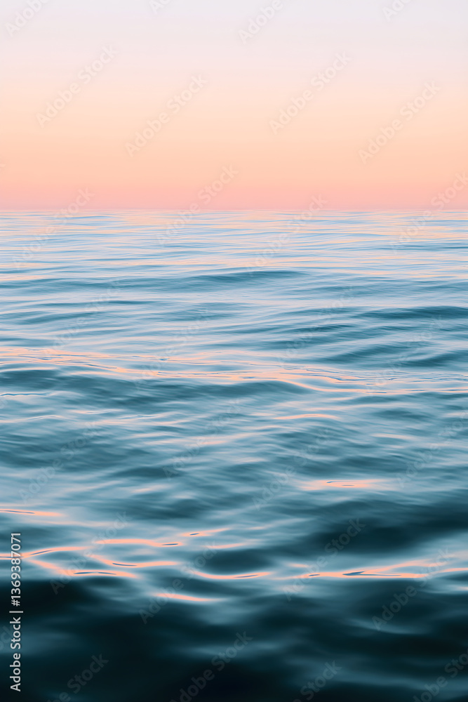 Fototapeta premium Serenity in Soft Hues: Gentle Ocean Waves Reflecting Tranquility and Calm