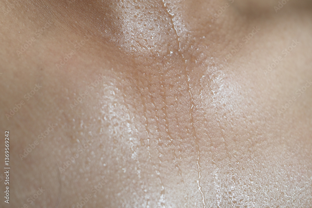 Fototapeta premium Close-up of glistening skin showing sweat and natural texture