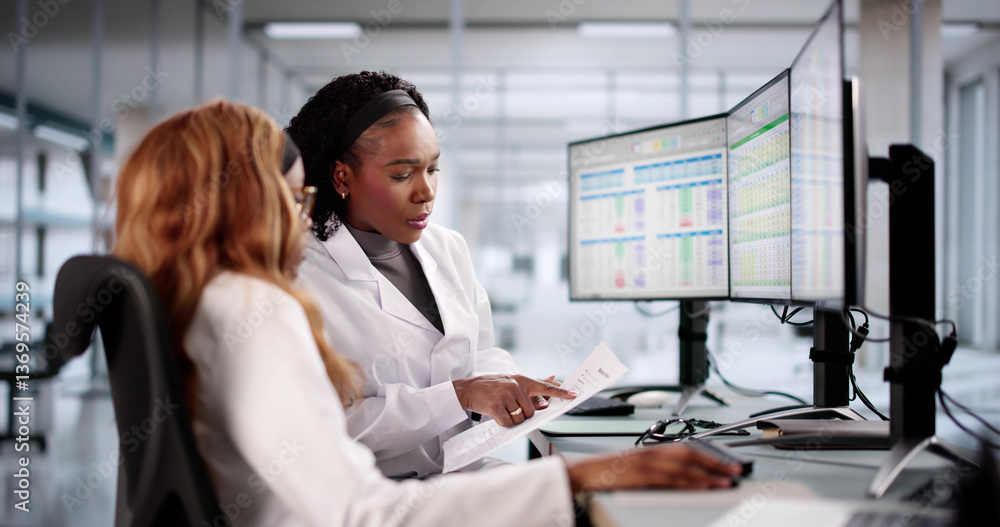 Medical coder enters billing codes into spreadsheet