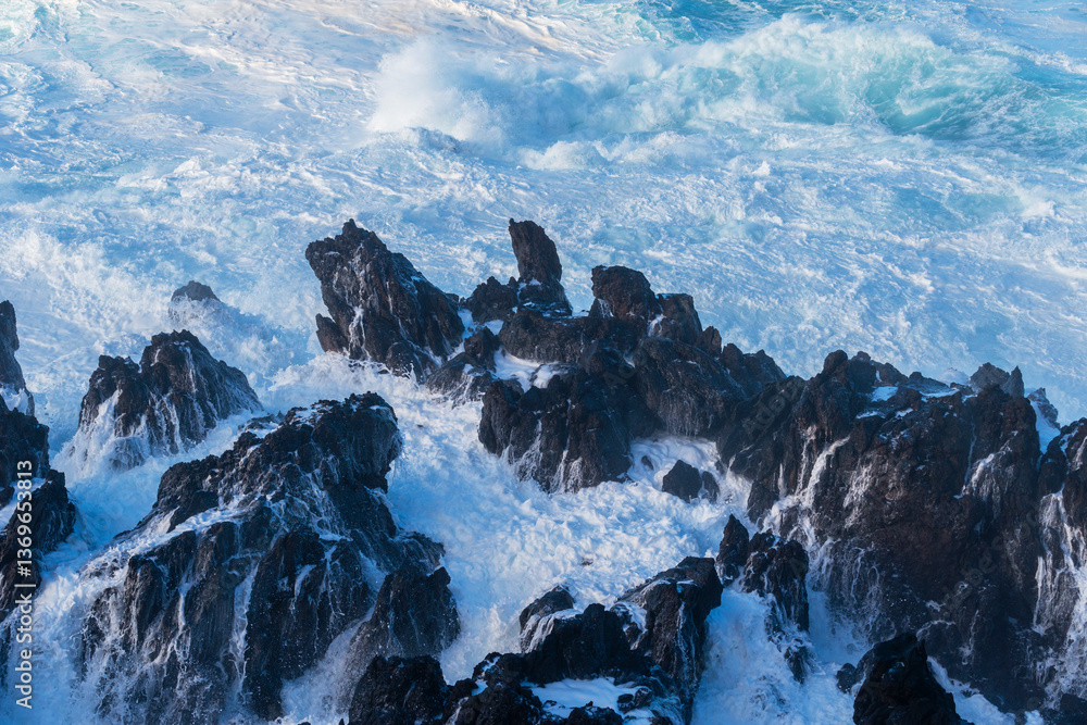 Powerful storm waves in Porto Moniz, on the Madeira Atlantic coastline, Portugal