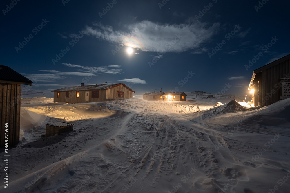 Full moon over Helags Mountain station in Jämtland, Sweden, during a cold and windy night in March.
