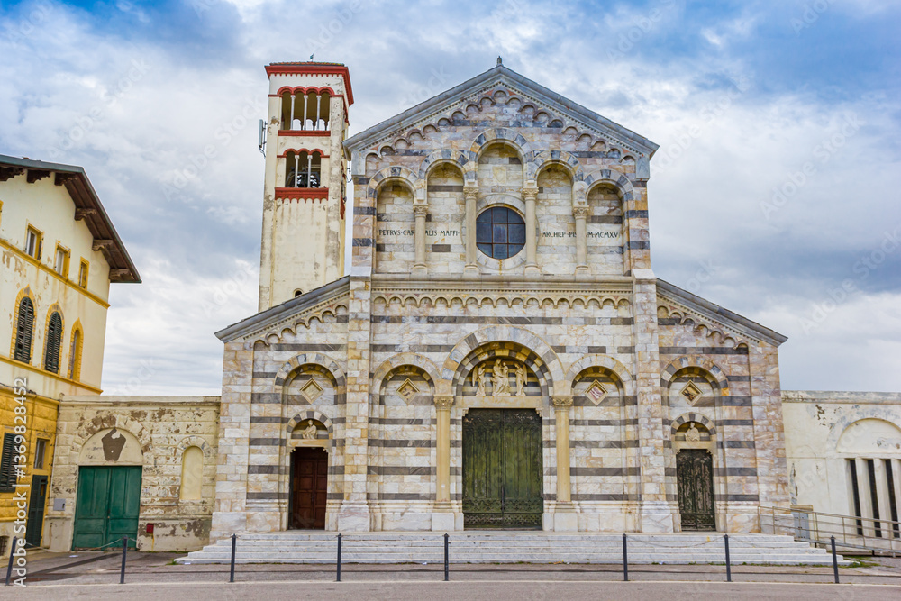 Front facade of the historic Santa Maria Ausiliatrice church in Marina di Pisa, Italy