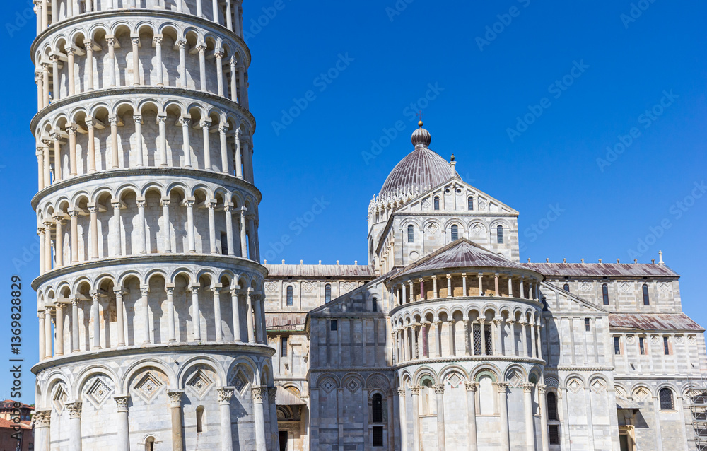 Historic leaning tower and the Duomo cathedral in Pisa, Italy